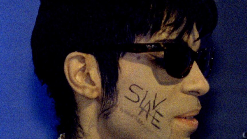 Prince with 'slave' written on his cheek