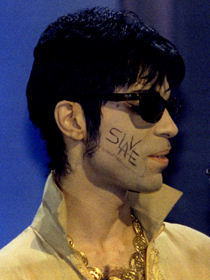 Prince with 'slave' written on his cheek