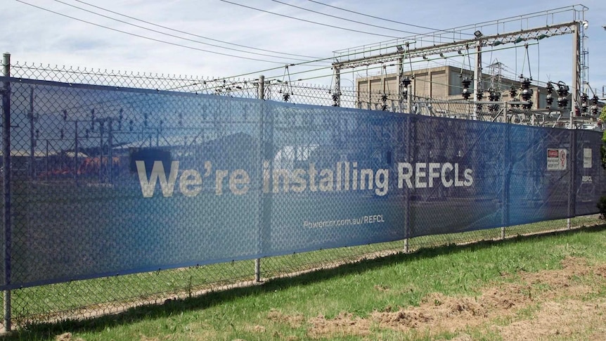 A sign says 'We're installing REFCLs'.