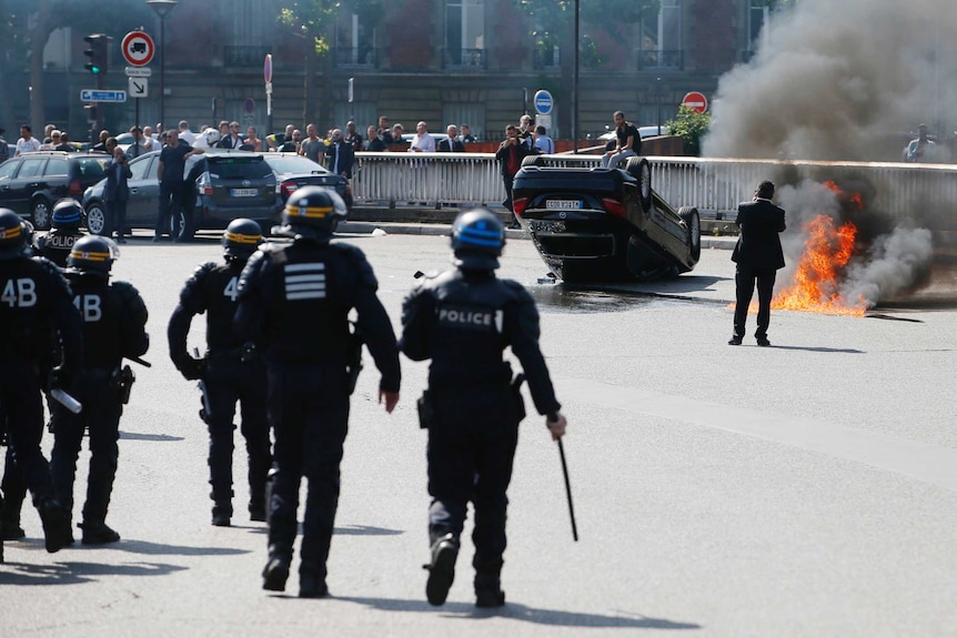 French riot police at Uber protest