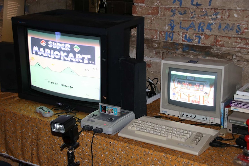 Vintage video games on a table.
