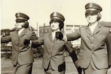 Ros Peters (middle) with the two other women, marching in uniform.