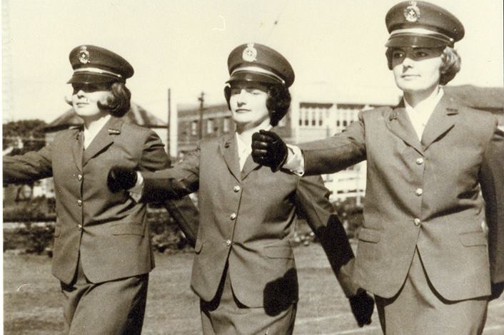 Ros Peters (middle) with the two other women, marching in uniform.