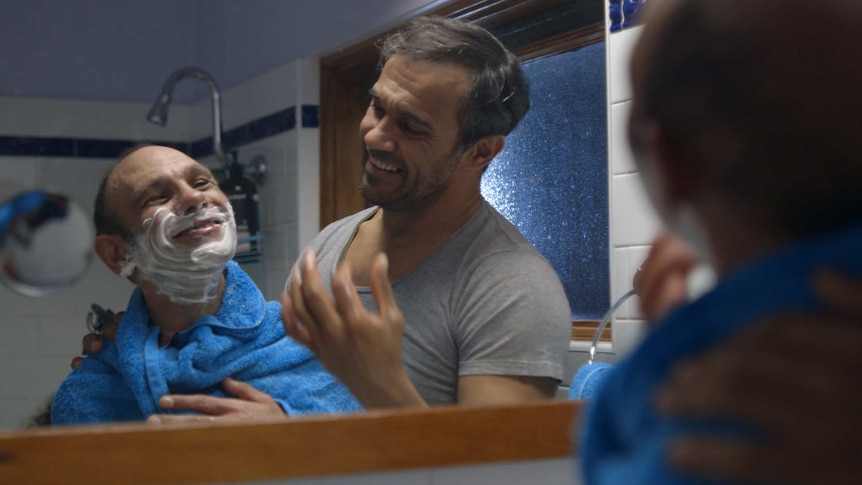 Aaron Pedersen helps his younger brother Vinnie shave