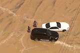 Waterlogged cars and eroded beaches on the Gold Coast