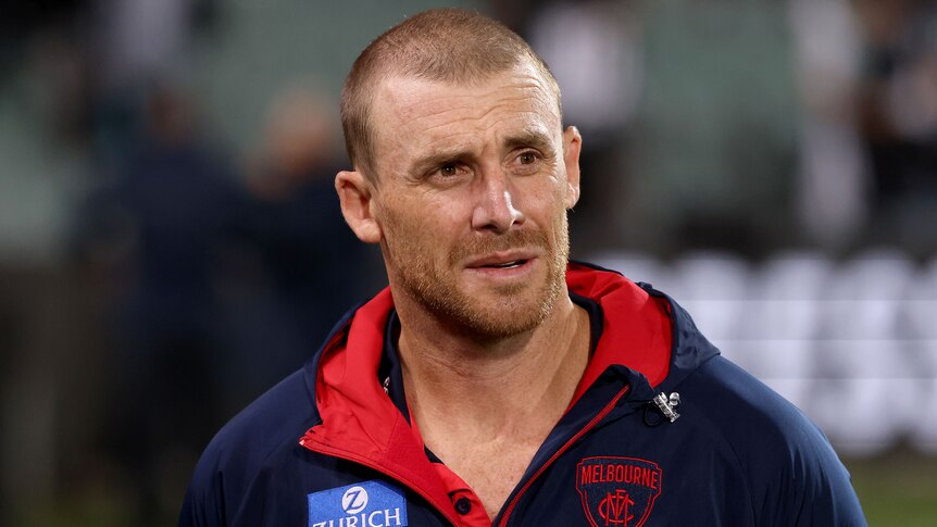 The Melbourne AFL coach looks on during a match at Adelaide Oval.