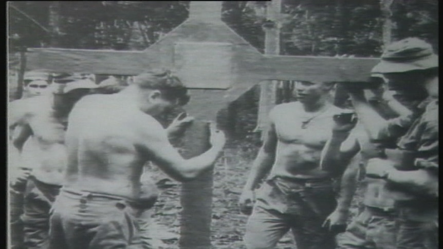B&W photo: The original Long Tan cross was erected on the battle ground in Vietnam in the 1960s. File Footage