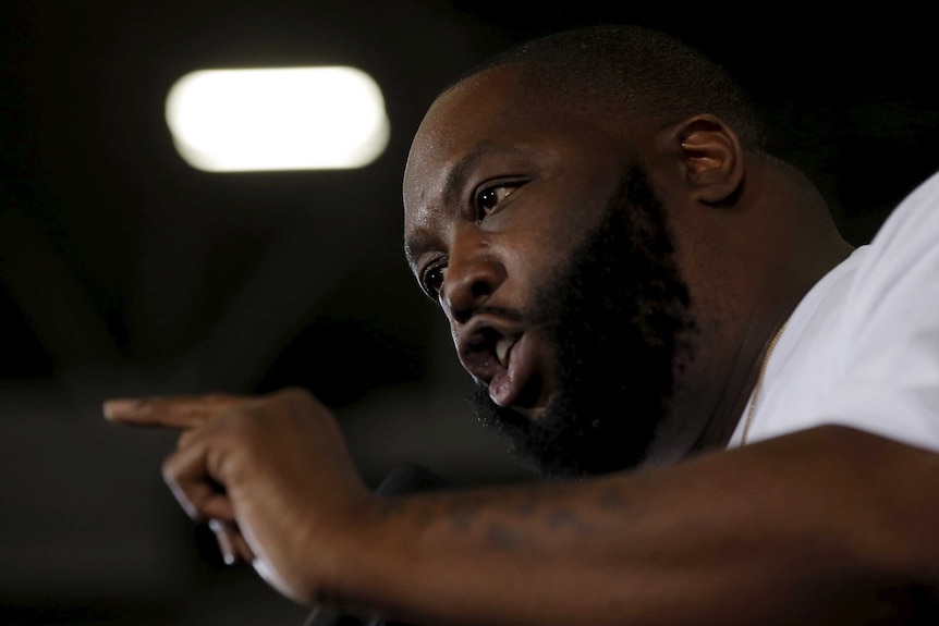 Close-up of Killer Mike speaking and pointing his finger