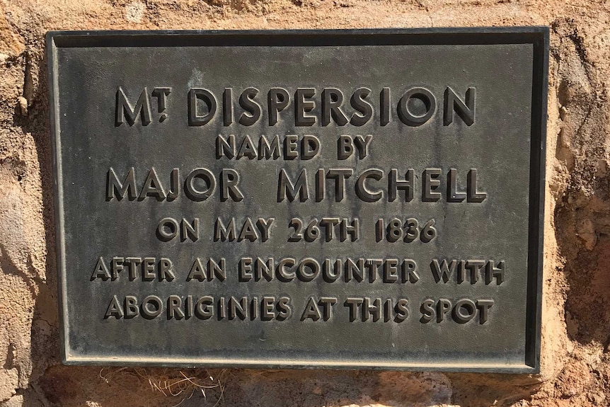 a plaque reading 'Mt Dispersion named by Major Mitchell on May 26th 1836' after an encounter with Aborigines at this spot'