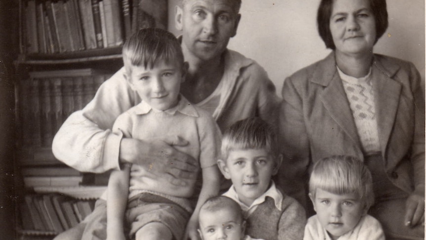 Old photo of family - mum, dad, four children