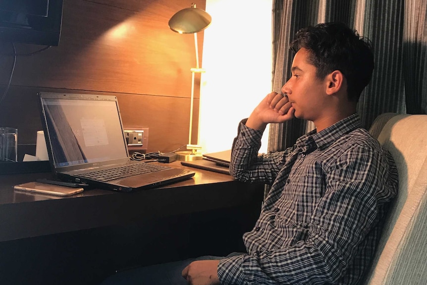 Co-creator of Kashbook Alternative Social Media Platform Zeyan Jeelani stares at his computer