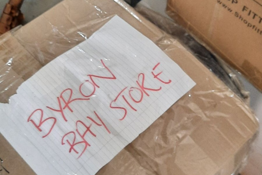 Brown box that has a label saying "Byron Bay store.