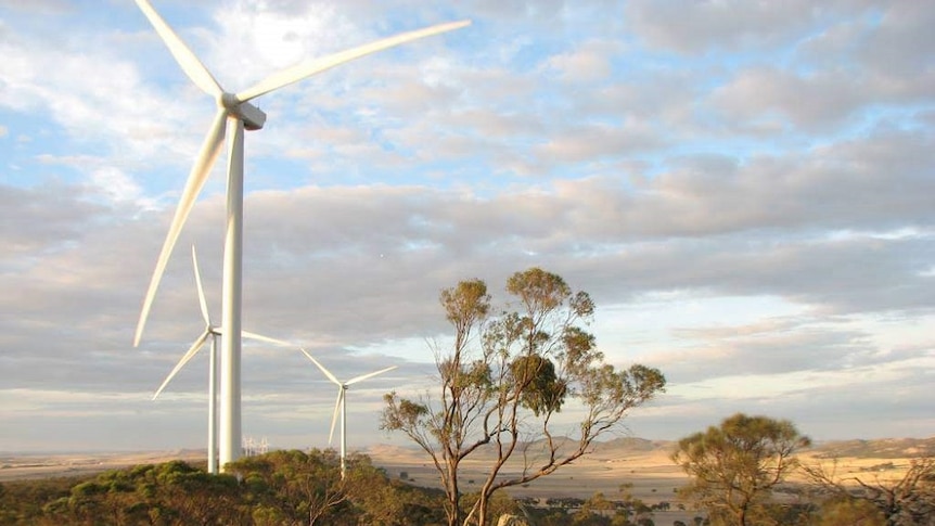 A wind tower in rural setting