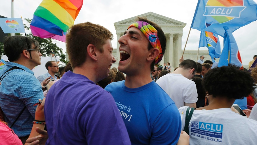 Gay rights supporters celebrate after a US Supreme Court ruling that same-sex couples have the right to marry