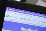 A Brisbane man has been charged with defacing Facebook tribute pages.