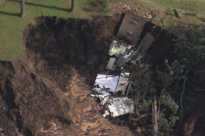 A sinkhole that opened up after flooding