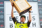 Mick Fanning celebrates winning the Bells Beach title