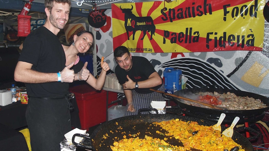 Cooking up paella for the crowds at Vic Park hawkers market