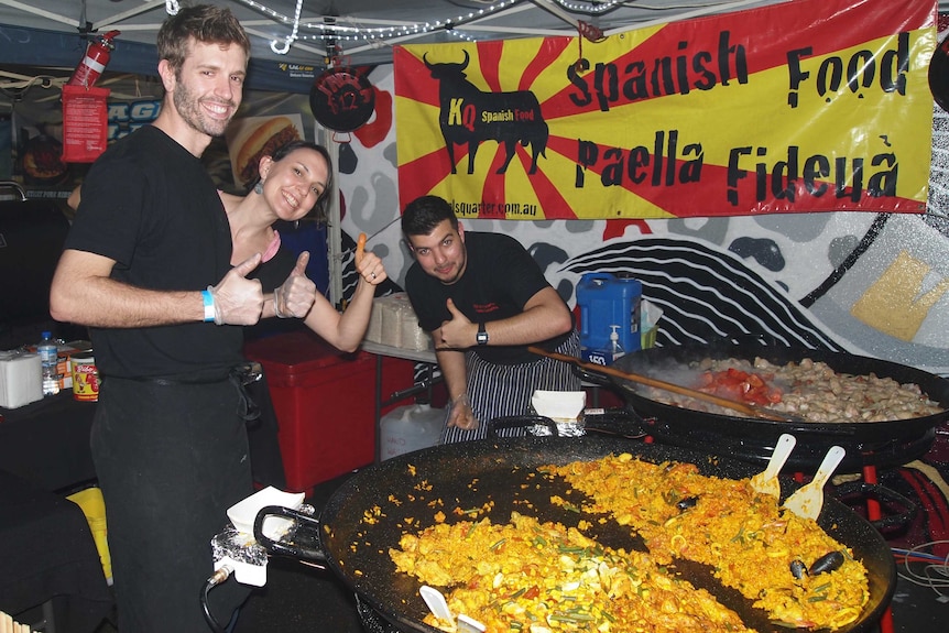 Cooking up paella for the crowds at Vic Park hawkers market