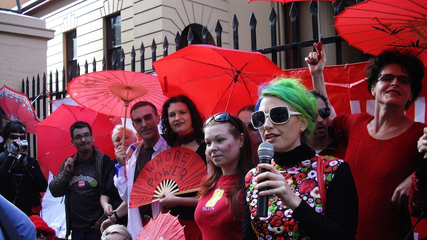 Sex workers face the media outside NSW Parliament House. (Image: Scarlet Alliance)