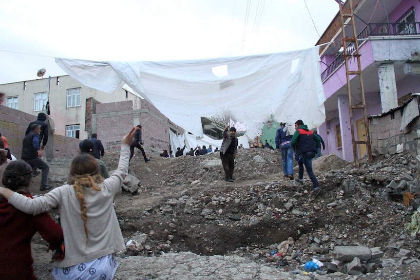 Silvan residents march to protest the curfew.