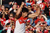 Callum Sinclair of the Swans celebrates scoring during the AFL elimination final match between the Sydney Swans and Essendon.