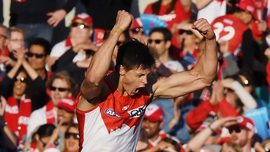 Callum Sinclair of the Swans celebrates scoring during the AFL elimination final match between the Sydney Swans and Essendon.