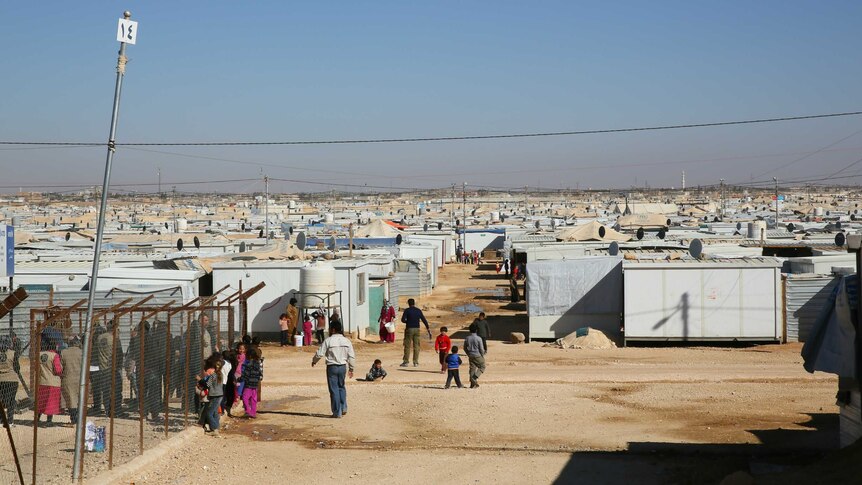 Tens of thousands of tents in the desert of Jordan make up the Zaatari Syrian refugee camp.