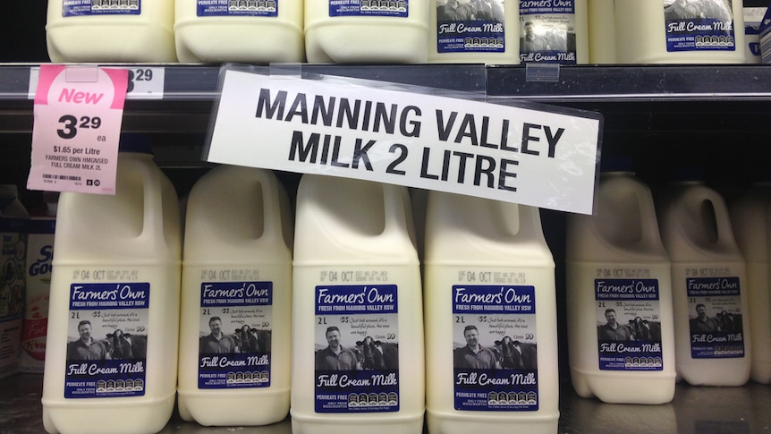 Milk being sold on supermarket shelves