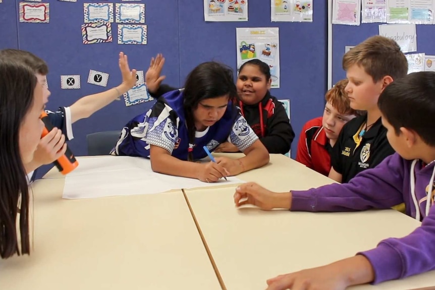 Group of children from Broken Hill working in their classroom