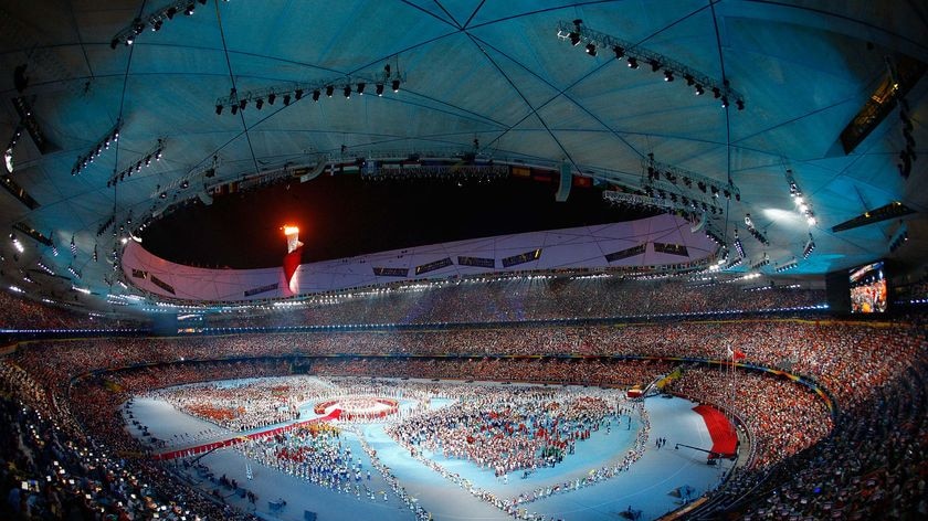 The competing athletes at the Beijing Olympic Games gather in the Bird's Nest stadium