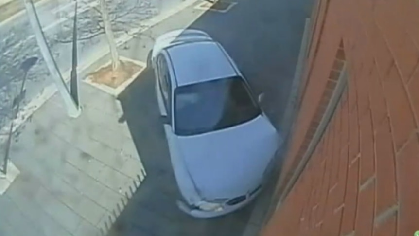 Canberra man crashes car into police station