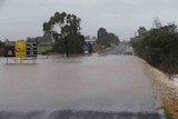 Princes Highway flooded at Nicholson