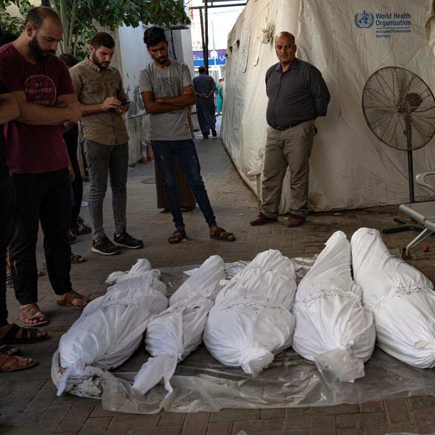 Palestinians mourn relatives killed in the Israeli bombardment of Gaza.