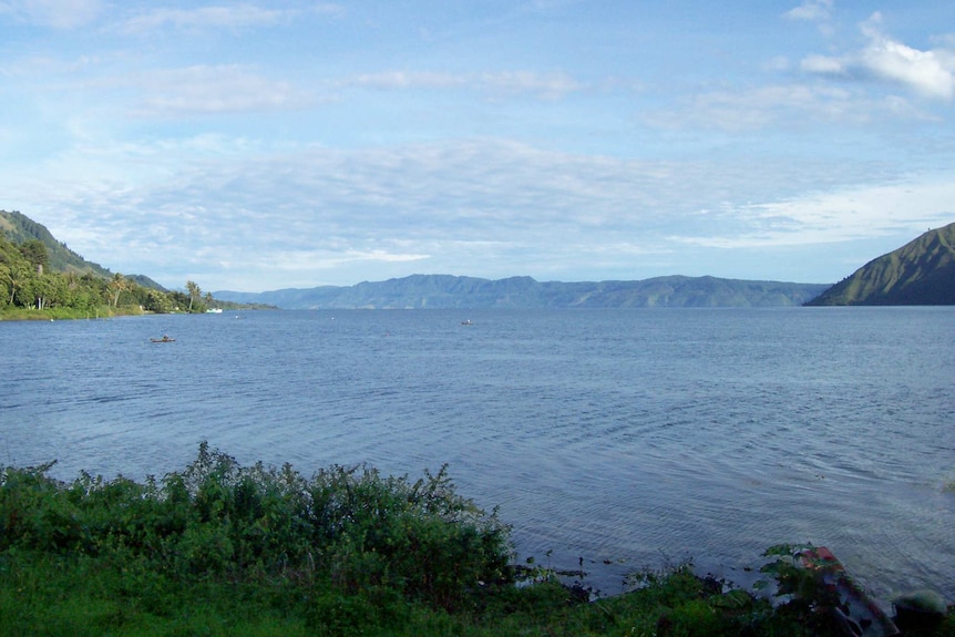 Lake Toba, with surrounding green hills