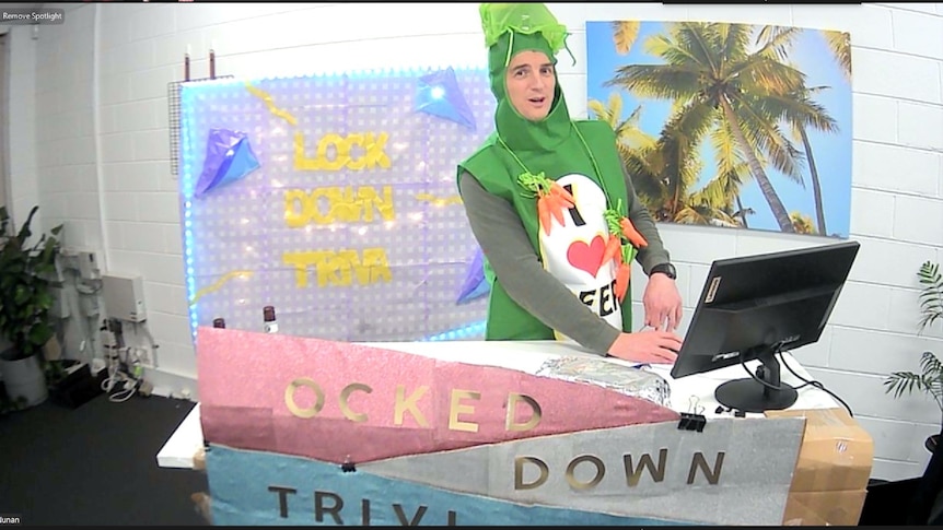 A Zoom screenshot of a man dressed as sauce on a computer