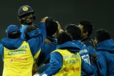 Adela Gunaratne of Sri Lanka is hugged by his teammates after hitting a four and winning the T20 series.