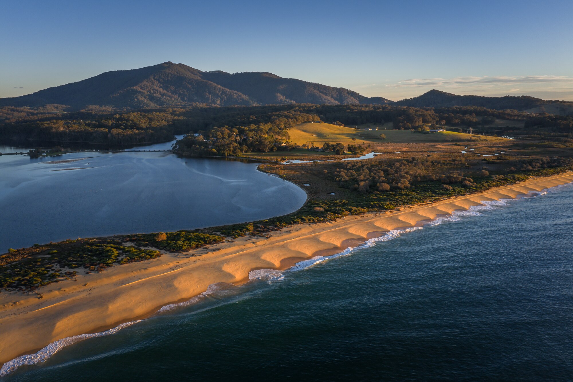a shot of patterned sand from a drone in the sky