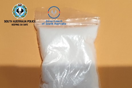 A small bag containing a white powder