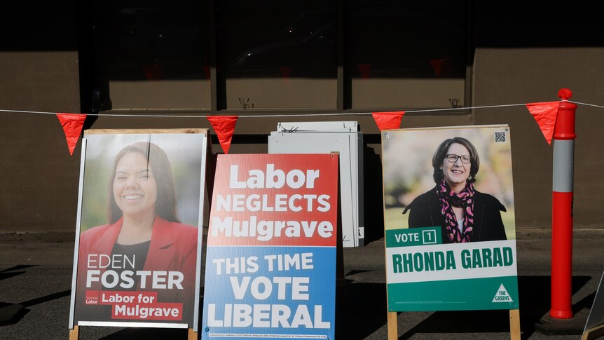 Vote Labor and Vote Greens signs at a prepolling booth.