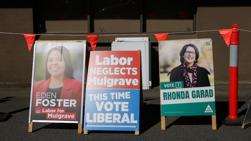 Vote Labor and Vote Greens signs at a prepolling booth.