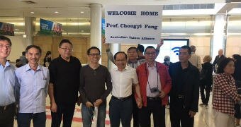 Chongyi Feng returns to Australia after being detained in China.