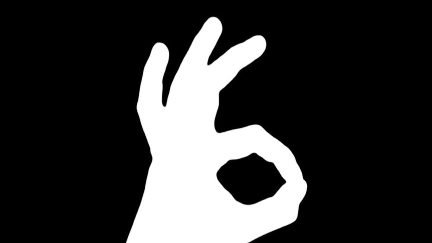 A graphic image of a white hand making the 'okay' sign on a black background