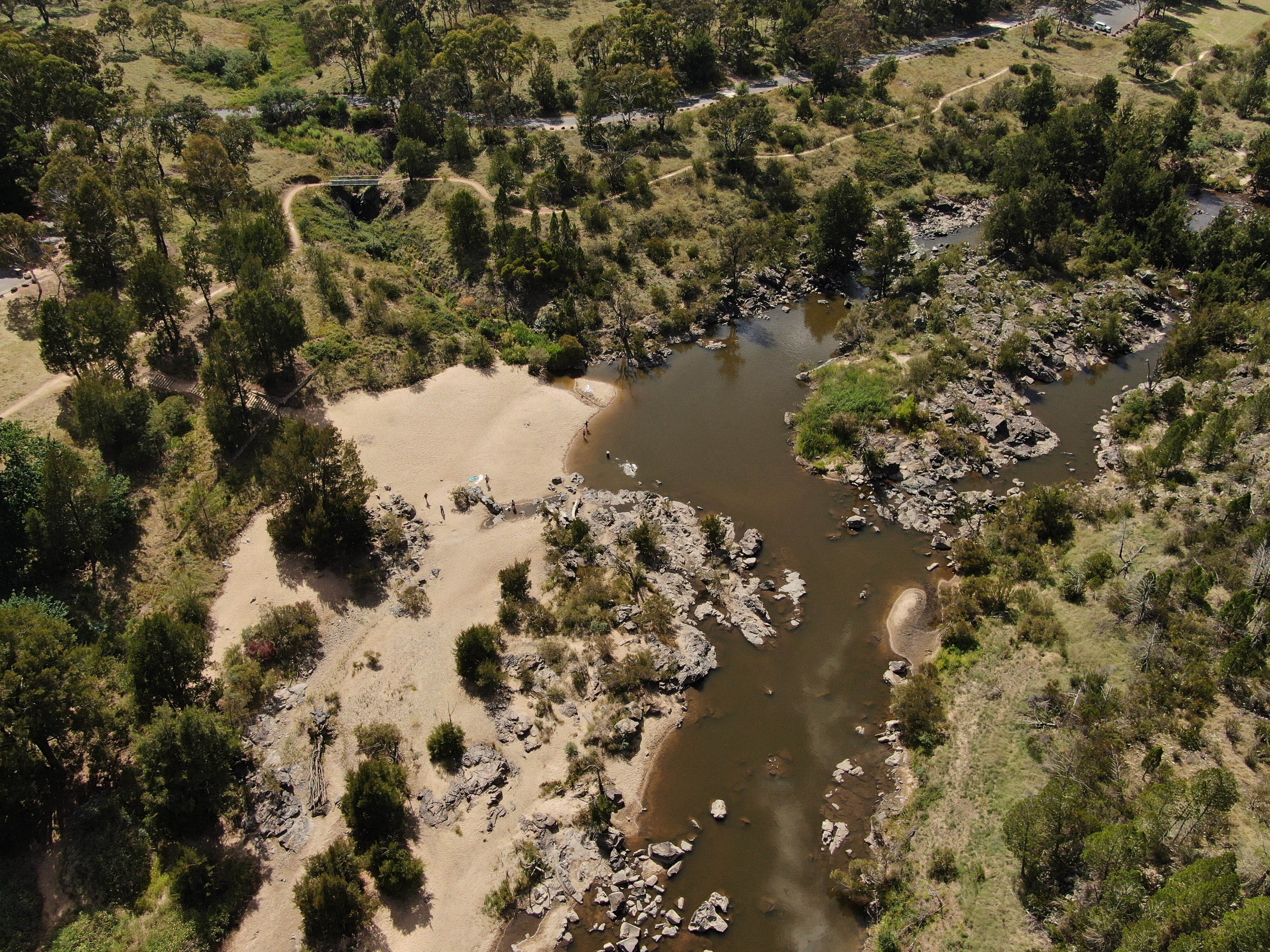 An aerial perspective of a popular swimming area in Canberra, Pine Island
