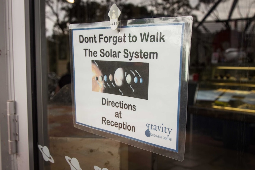 Sign - don't forget to walk the solar system at the GDC observatory.