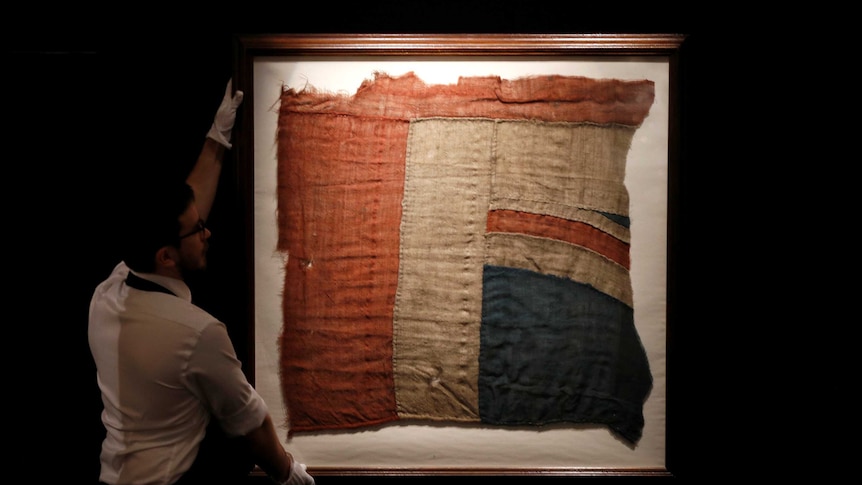 Pieces of the flag were broken up and kept by Lord Nelson's loyal sailors.