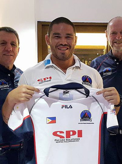 Eric Erikson holds one of the jerseys for the Philippine rugby union team.