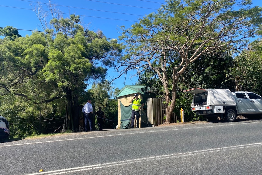 Police outside a home at Yugar.