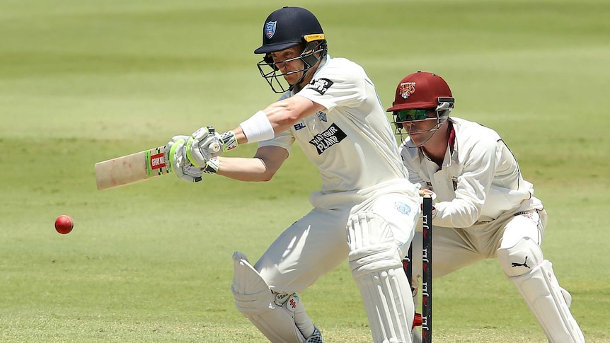 Peter Nevill attempts to play a shot to the off side against Queensland in the Sheffield Shield match at Allan Border Field.