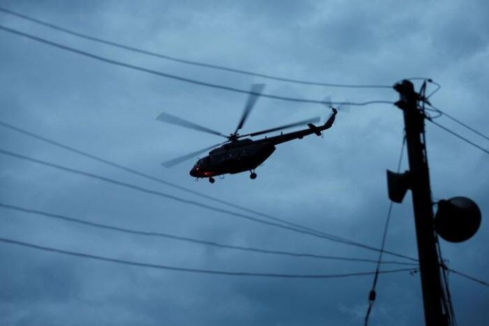 helikopter yang diyakini membawa anak laki-laki yang berhasil diselamatkan dari Gua Tham Luang